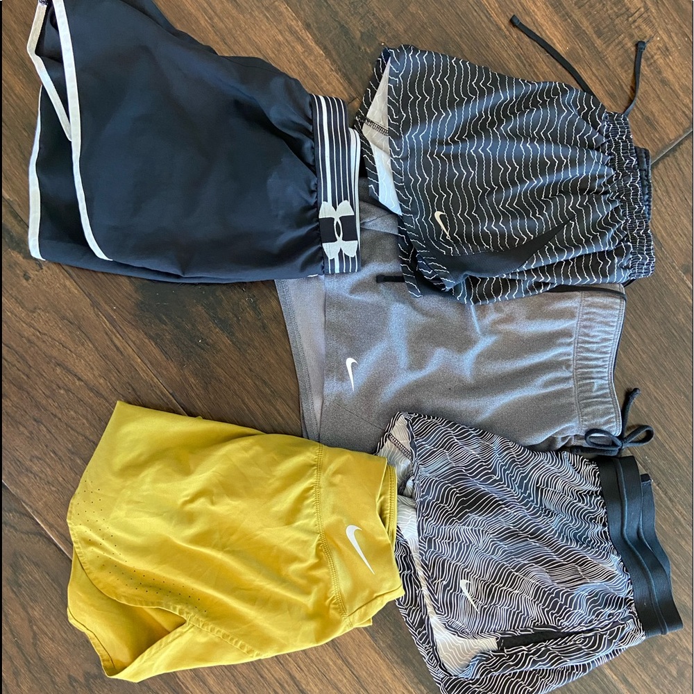 Used Medium (4) Nike & (1) UA women’s shorts